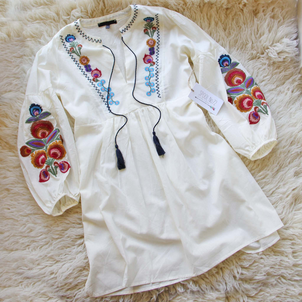 embroidered lantern sleeve tassel tie smock dress GENKIRA Eyelet Embroidery Lantern Sleeve Ruffle Hem Smock Dress